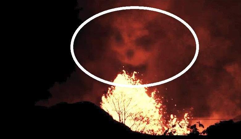 A démoni arc arca folt a lángoló Hawaii felett