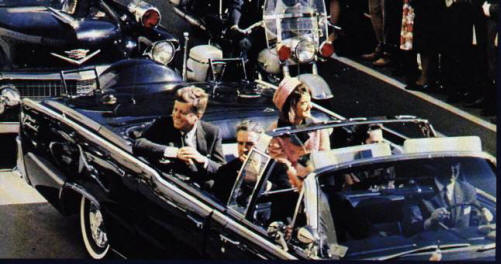 Az idegenek és George W. Bush részt vesznek John F. Kennedy meggyilkolásában.